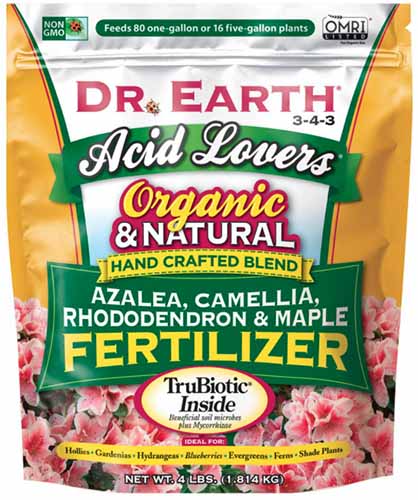 Una imagen cuadrada de primer plano del envase de Dr Earth Fertilizer para plantas ácidas.